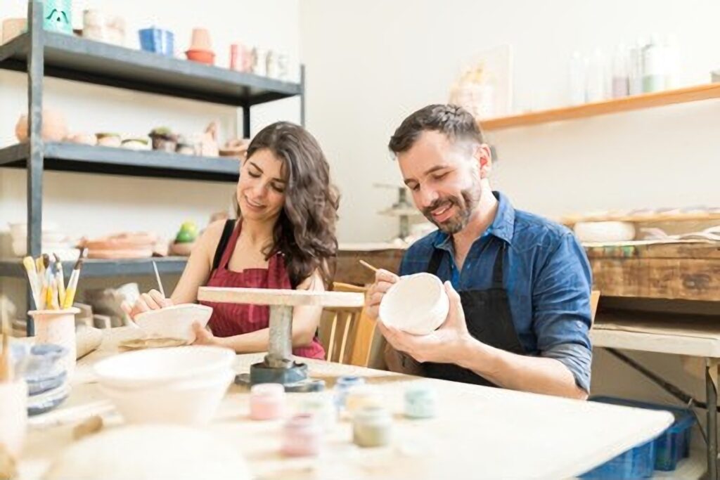 A couple doing art class for their Valentine's Day