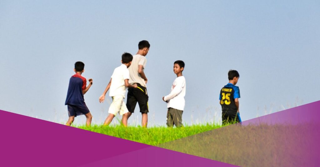 Children playing outside, including Balinese traditional games