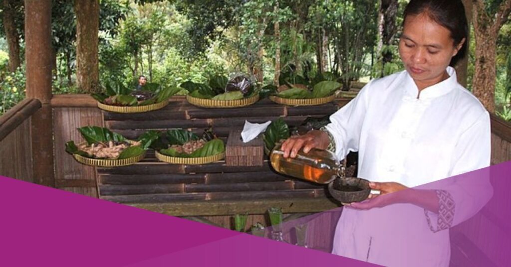 A woman serving jamu