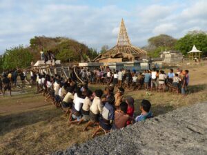 locals help Andre Graff to build a water well in Sumba