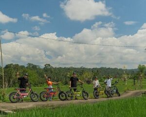 A group of people cycling at Mengwi Village